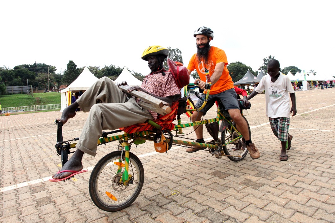 Maneuvering an inclusive orange tandem profile down tight urban walkways