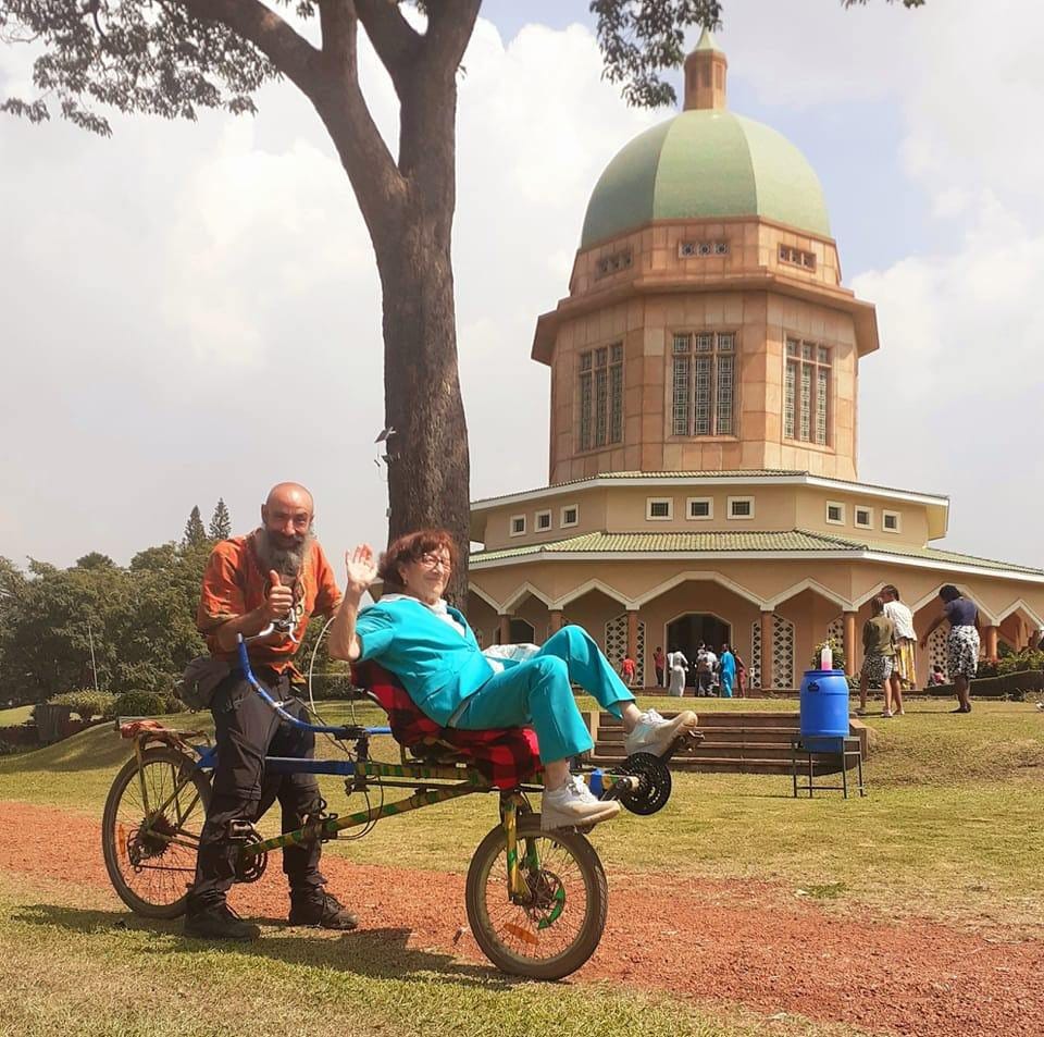 Elderly participant enjoying an inclusive neighborhood ride